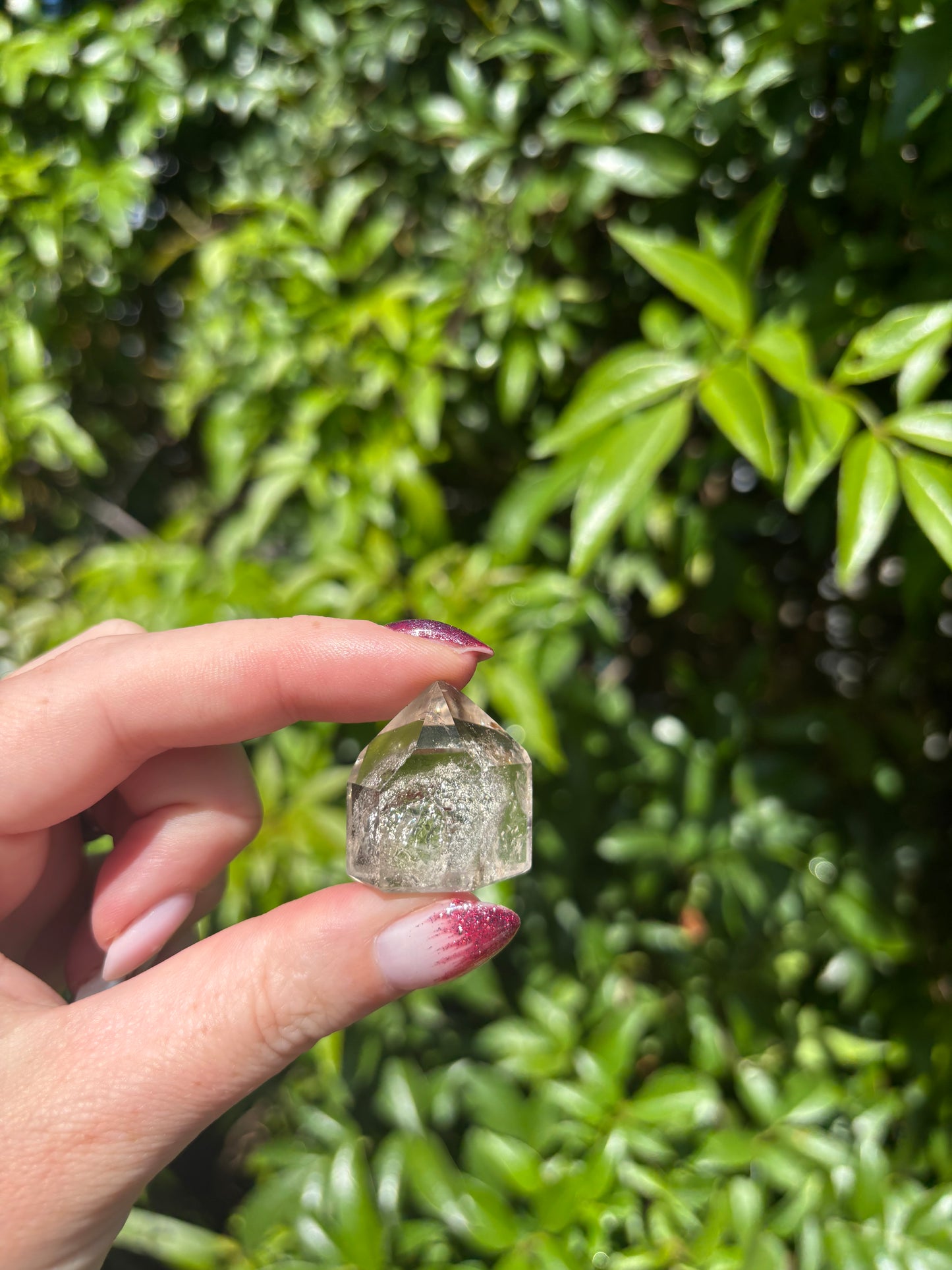 Quartz With Inclusions Polished Point O
