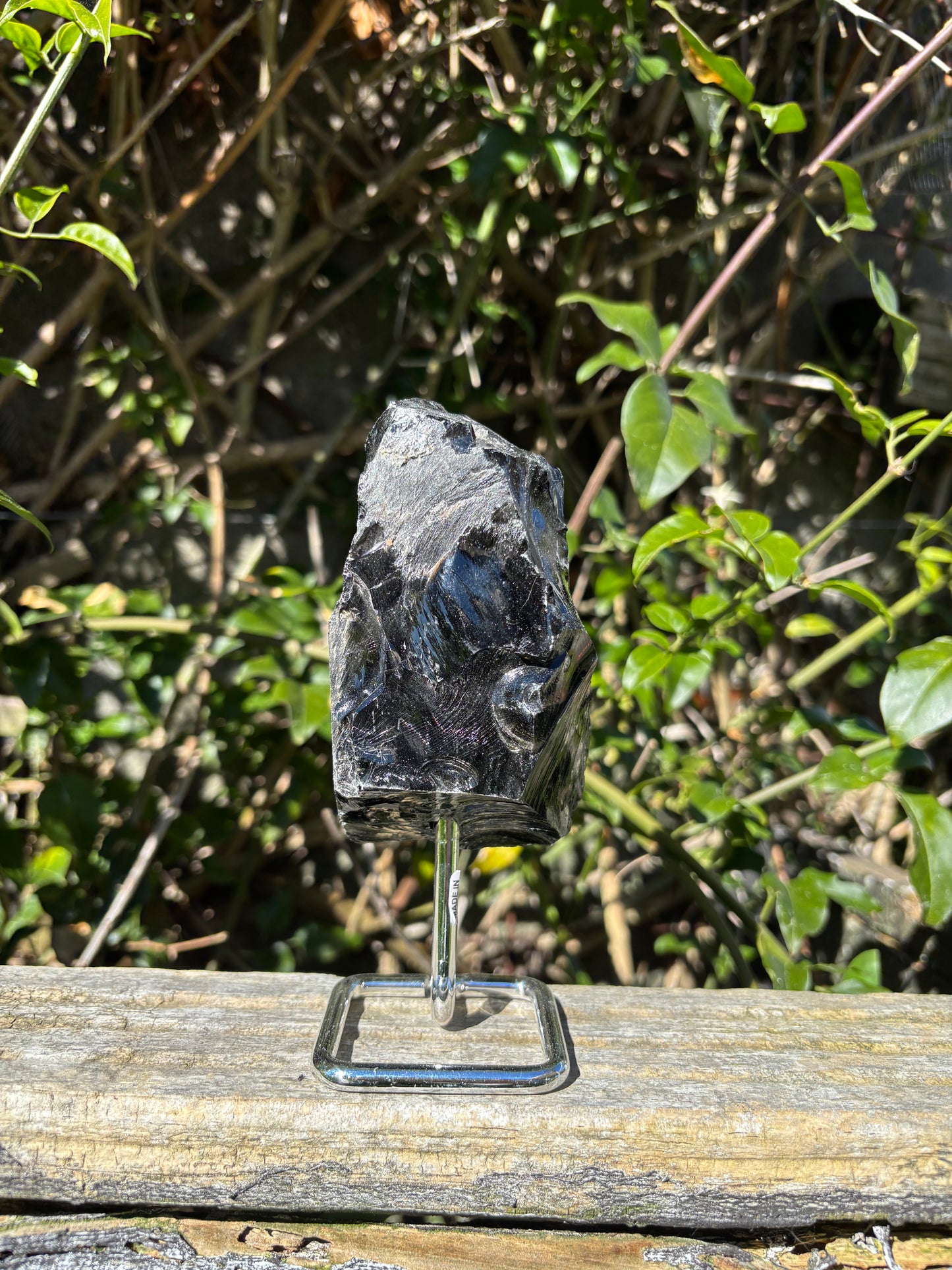 Black Obsidian Rough On Metal Stand