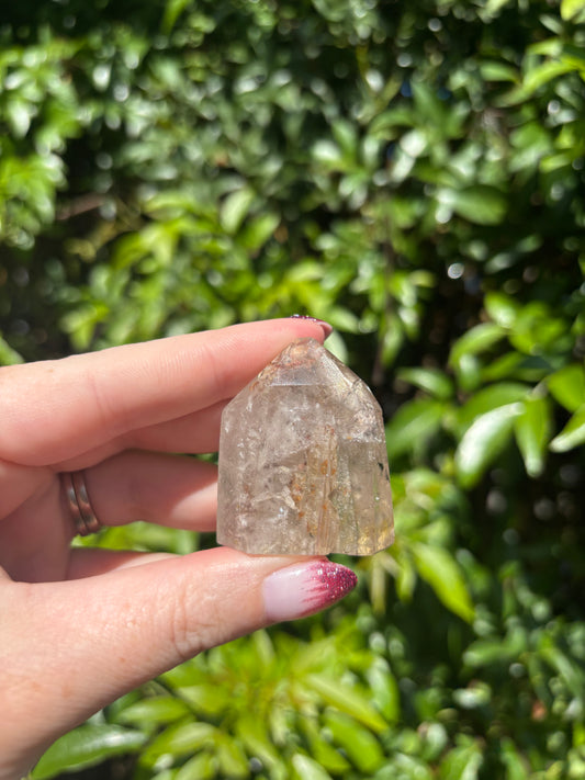 Quartz With Inclusions Polished Point i