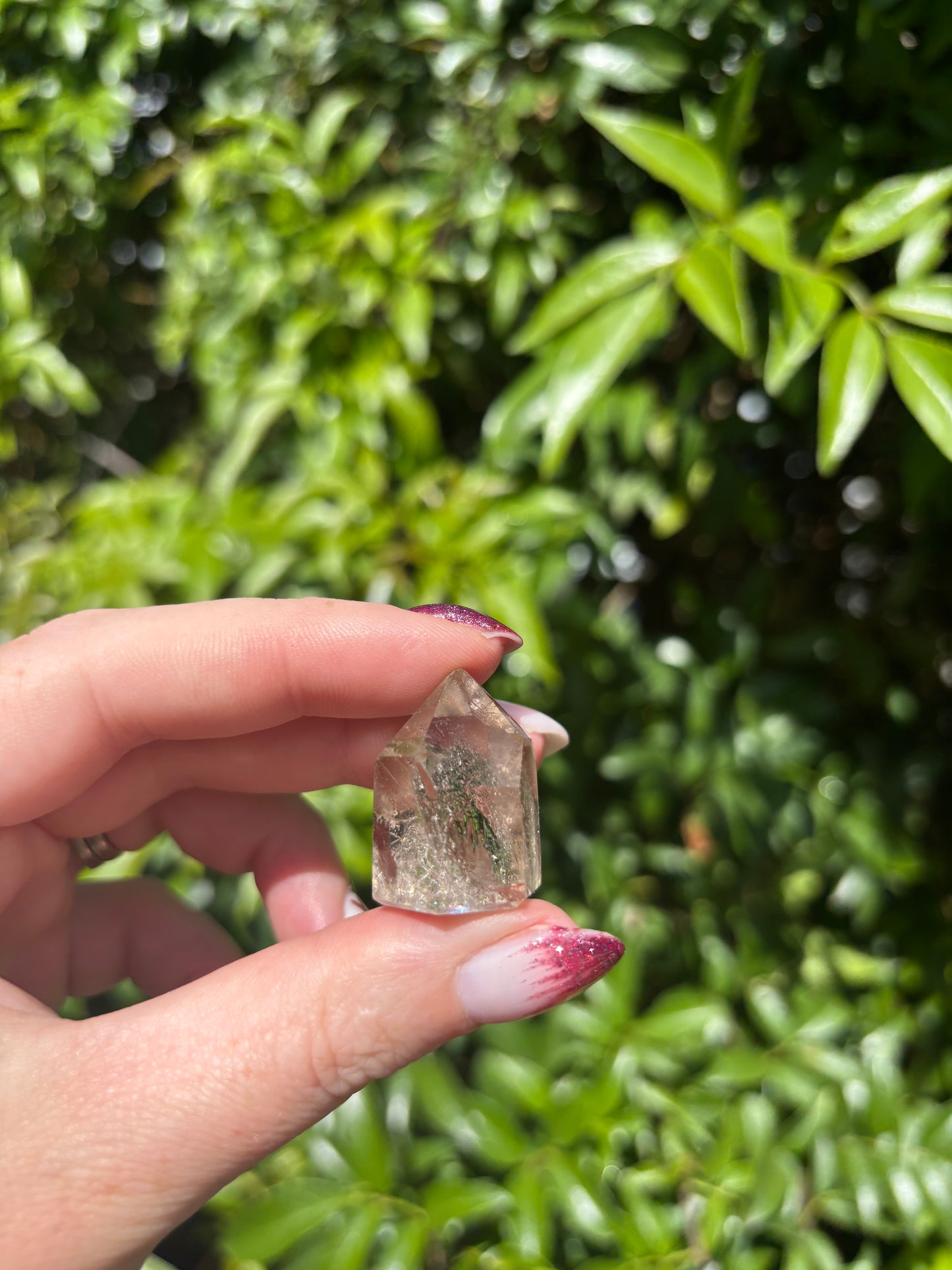 Quartz With Inclusions Polished Point O